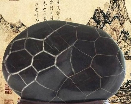 Stone sculpture with turtle pattern